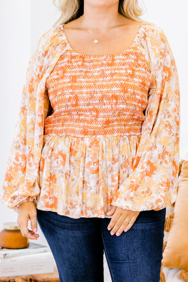 Chic Soul plus size clothing, multi-color orange top with long bubble sleeves and floral pattern as well as stitching details on the chest 