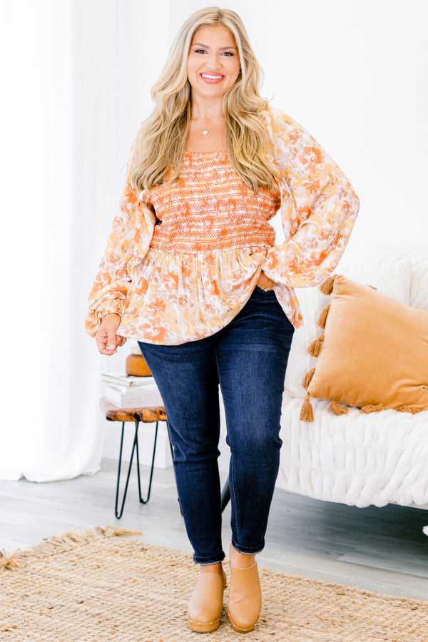 Chic Soul plus size clothing, multi-color orange top with long bubble sleeves and floral pattern as well as stitching details on the chest 