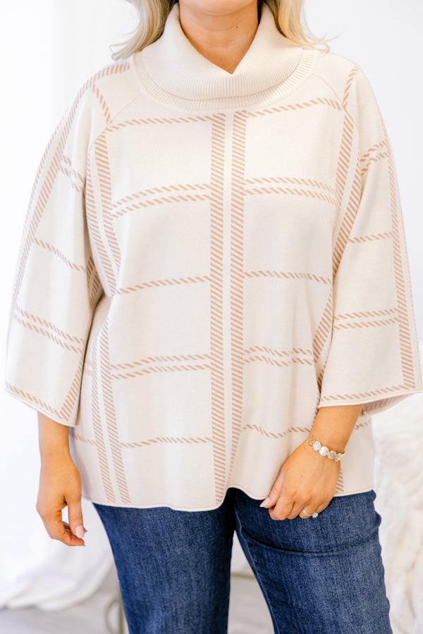 Chic Soul plus size clothing, cream 3/4 sleeve poncho style top with light tan striped patterning and a turtleneck