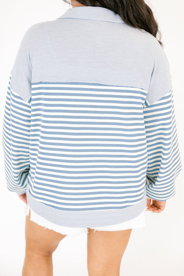 Chic Soul plus size clothing, blue striped pullover with long sleeves and a solid light blue stripe going along the v-neckline as well as buttons going down one side