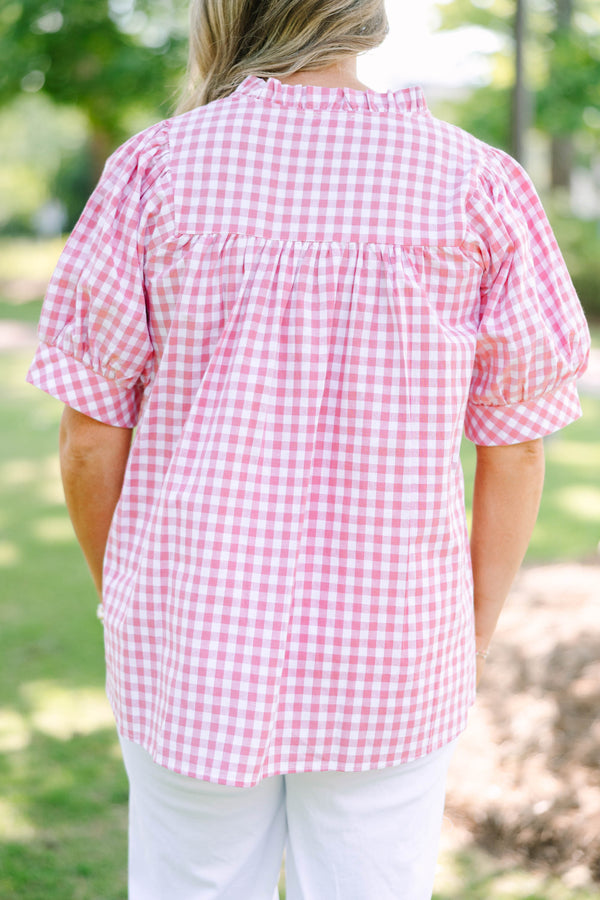Plus Size pink and white gingham top featuring a split neckline and voluminous puff sleeves.