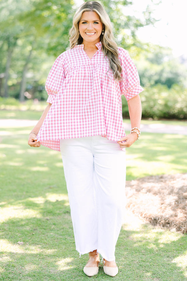 Plus Size pink and white gingham top featuring a split neckline and voluminous puff sleeves.