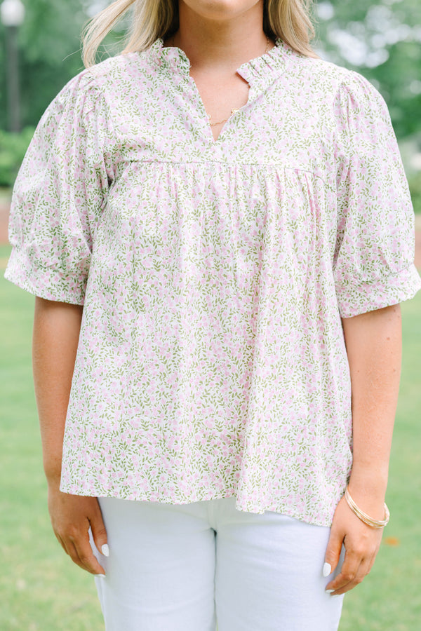 Plus Size pink and green floral print babydoll top with puff sleeves and a split neckline.