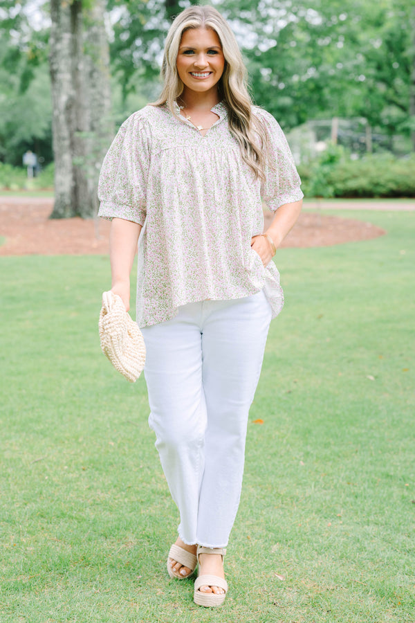 Plus Size pink and green floral print babydoll top with puff sleeves and a split neckline.