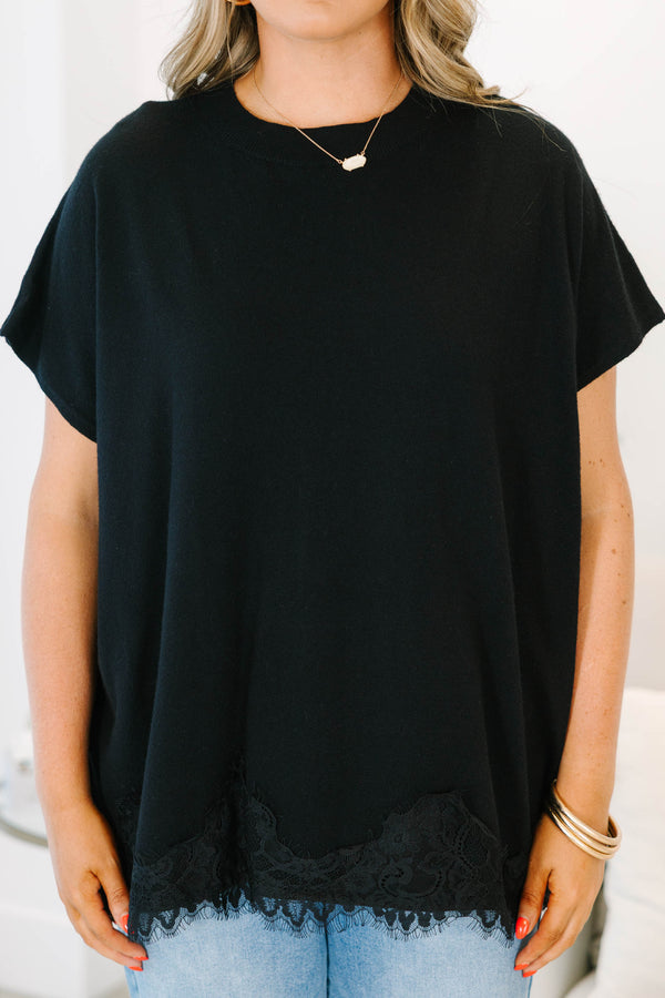 Plus Size black oversized sweater with short sleeves and a delicate lace hem detail.