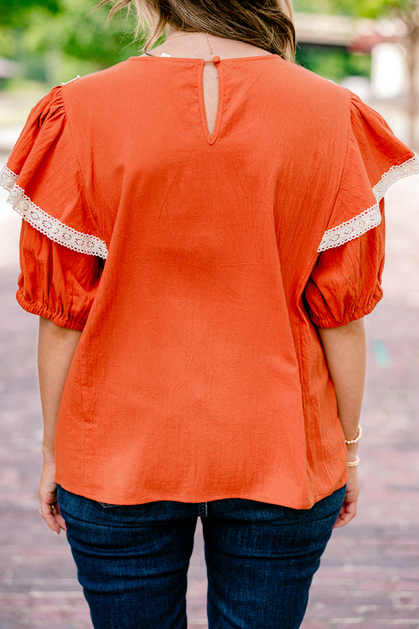 Chic Soul plus size clothing, rust colored top with bubble sleeves that have a ruffle on top that is trimmed in lace as well as a embroidered floral detail on the chest