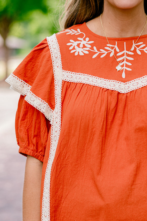 Chic Soul plus size clothing, rust colored top with bubble sleeves that have a ruffle on top that is trimmed in lace as well as a embroidered floral detail on the chest