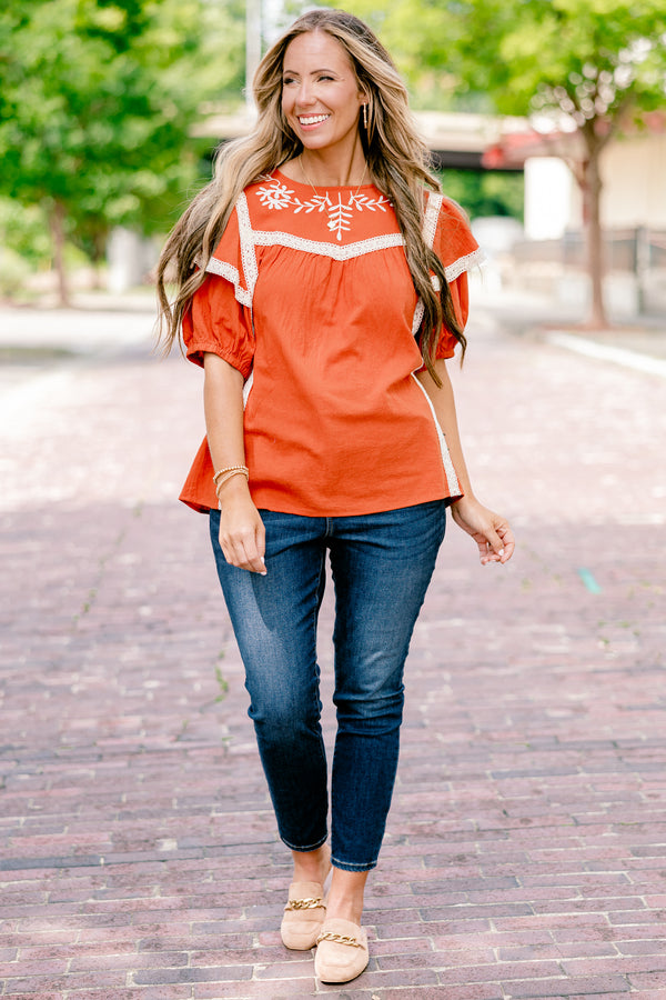 Chic Soul plus size clothing, rust colored top with bubble sleeves that have a ruffle on top that is trimmed in lace as well as a embroidered floral detail on the chest
