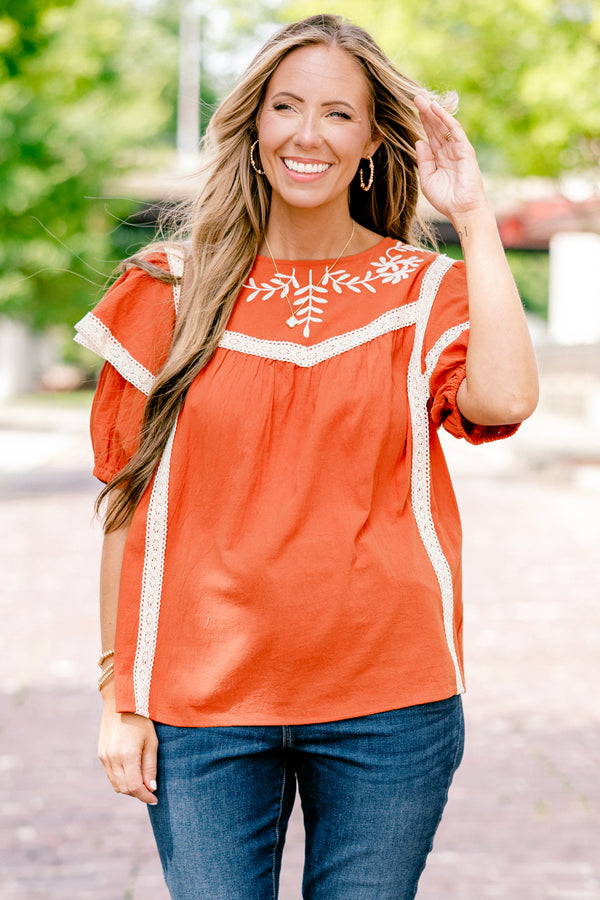 Chic Soul plus size clothing, rust colored top with bubble sleeves that have a ruffle on top that is trimmed in lace as well as a embroidered floral detail on the chest