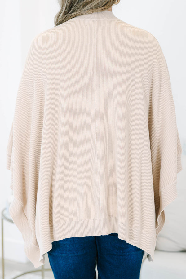 Plus Size taupe ribbed knit poncho with a mock neckline and wide, draped sleeves.