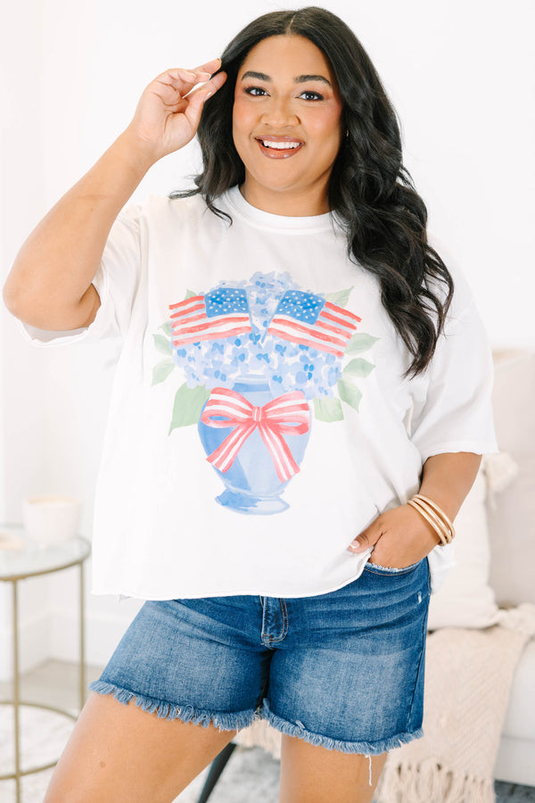 Plus Size white vintage wash tee with a hydrangea and American flag graphic and raw hems.