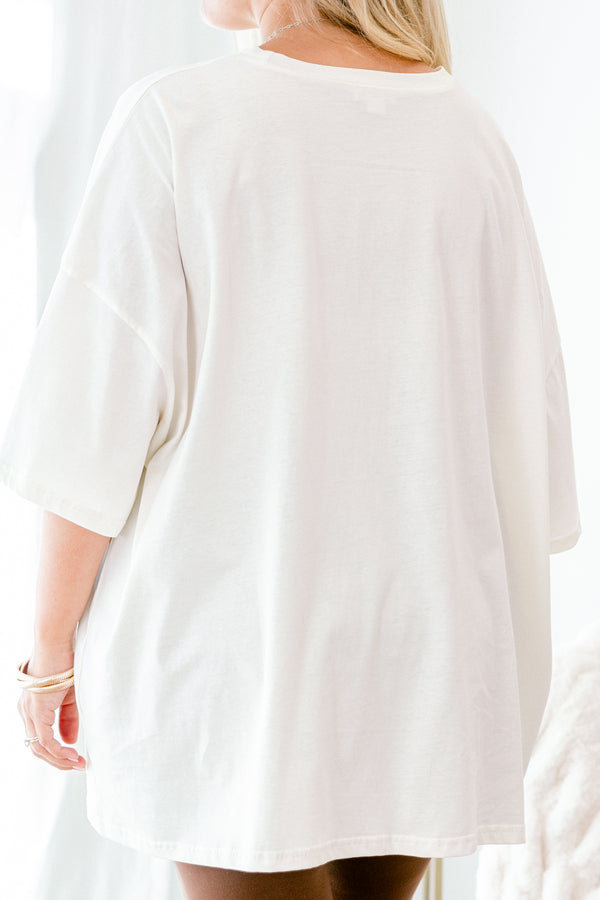 Chic Soul plus size clothing, Ivory Short sleeve graphic tee with a black smiley face in the center of the shirt that is filled with a light pink daisy pattern 