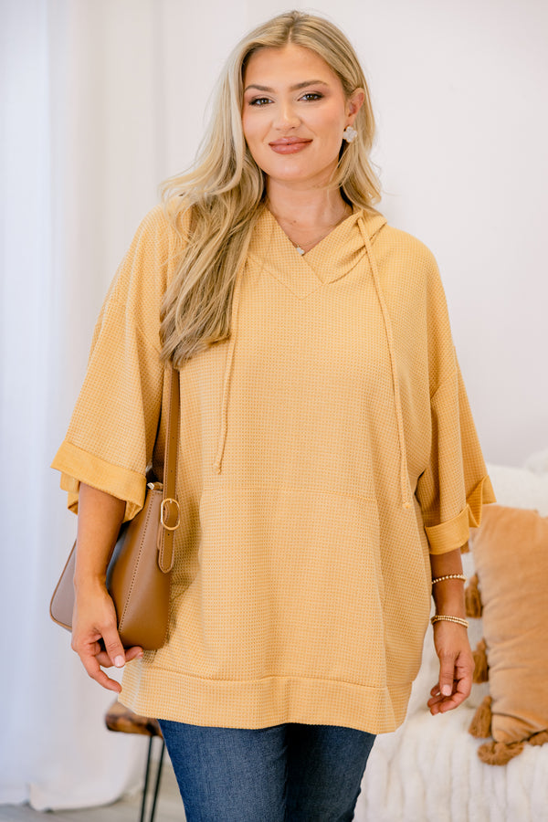 Chic Soul plus size clothing, marigold top with half sleeves that have a cuff at the end of the sleeves as well as a slight v-neckline 