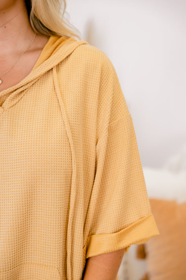 Chic Soul plus size clothing, marigold top with half sleeves that have a cuff at the end of the sleeves as well as a slight v-neckline 