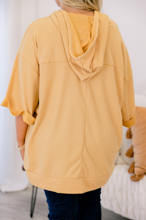 Chic Soul plus size clothing, marigold top with half sleeves that have a cuff at the end of the sleeves as well as a slight v-neckline 