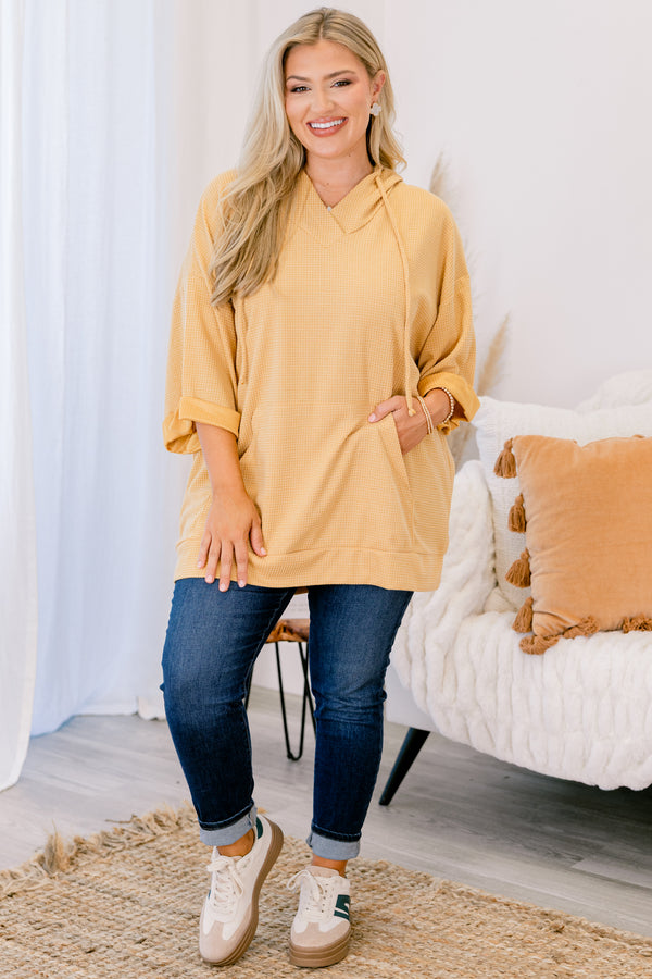 Chic Soul plus size clothing, marigold top with half sleeves that have a cuff at the end of the sleeves as well as a slight v-neckline 