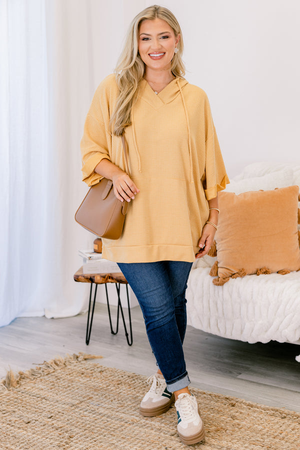 Chic Soul plus size clothing, marigold top with half sleeves that have a cuff at the end of the sleeves as well as a slight v-neckline 