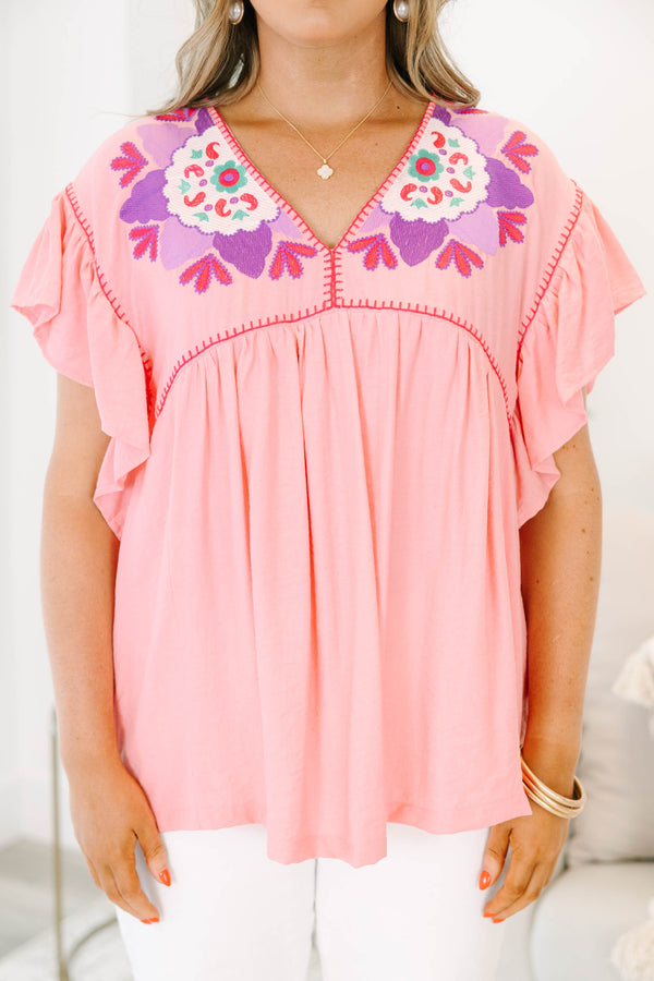 Chic Soul plus size clothing, light pink short-flutter sleeve shallow v-neck top with hot pink embroidered trim along neckline and shoulders plus purple and white embroidered pattern on shoulders