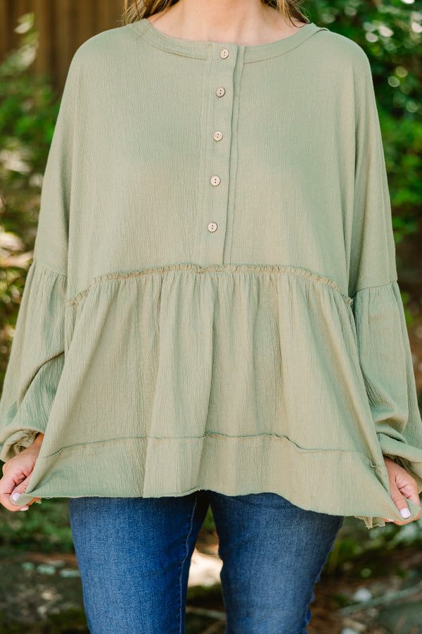 Chic Soul plus size clothing, olive green long sleeve baby doll top with buttons half way down 
