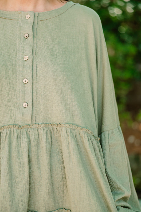 Chic Soul plus size clothing, olive green long sleeve baby doll top with buttons half way down 
