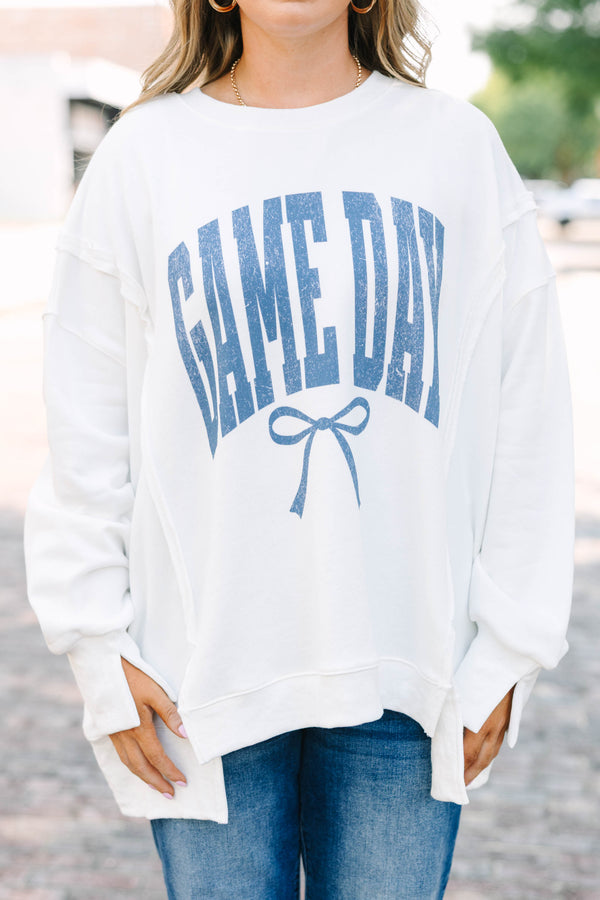 Plus Size ivory crew neck sweatshirt with blue 'GAME DAY' text and a bow graphic