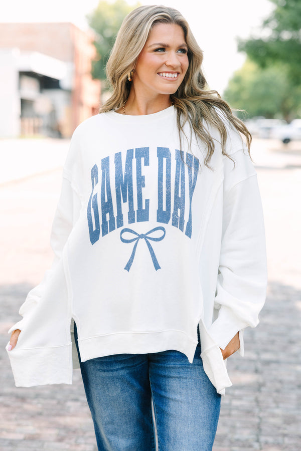 Plus Size ivory crew neck sweatshirt with blue 'GAME DAY' text and a bow graphic
