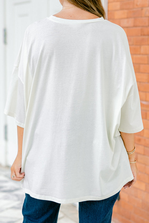 Chic Soul Plus size clothing, Ivory Short sleeve tee with football graphics bows and florals on the center of the shirt 
