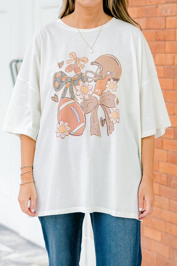 Chic Soul Plus size clothing, Ivory Short sleeve tee with football graphics bows and florals on the center of the shirt 
