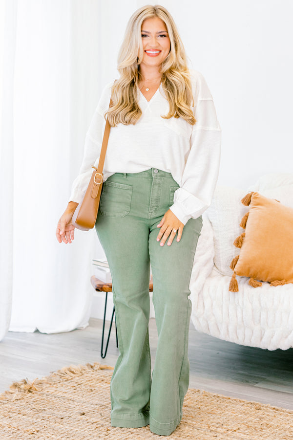 Chic Soul plus size clothing,  olive colored flare jeans with two front pockets 