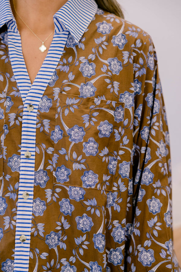 Chic Soul plus size clothing, brown long sleeve button up blouse with a collar and blue floral print and blue pin stripe fabric along the buttons and collar