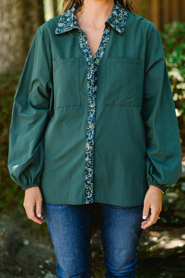 Chic Soul plus size clothing, dark green long sleeve button up top with floral pattern stripe vertically down the middle