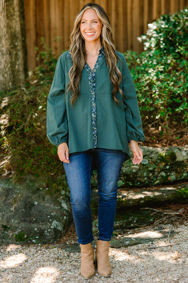 Chic Soul plus size clothing, dark green long sleeve button up top with floral pattern stripe vertically down the middle