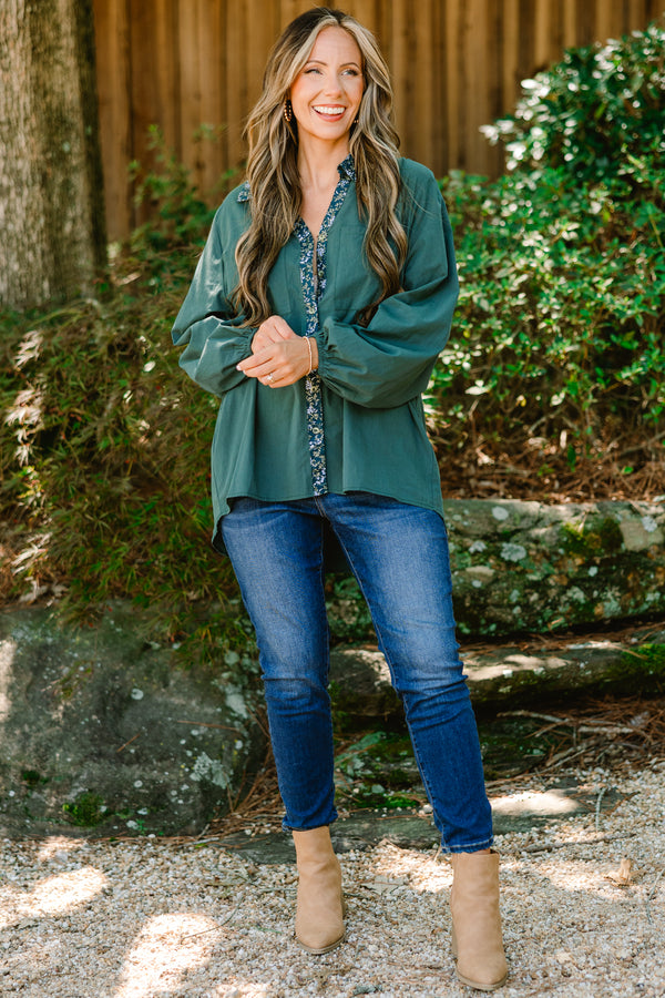 Chic Soul plus size clothing, dark green long sleeve button up top with floral pattern stripe vertically down the middle