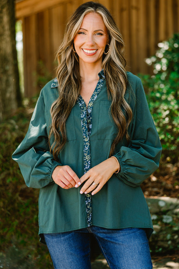 Chic Soul plus size clothing, dark green long sleeve button up top with floral pattern stripe vertically down the middle