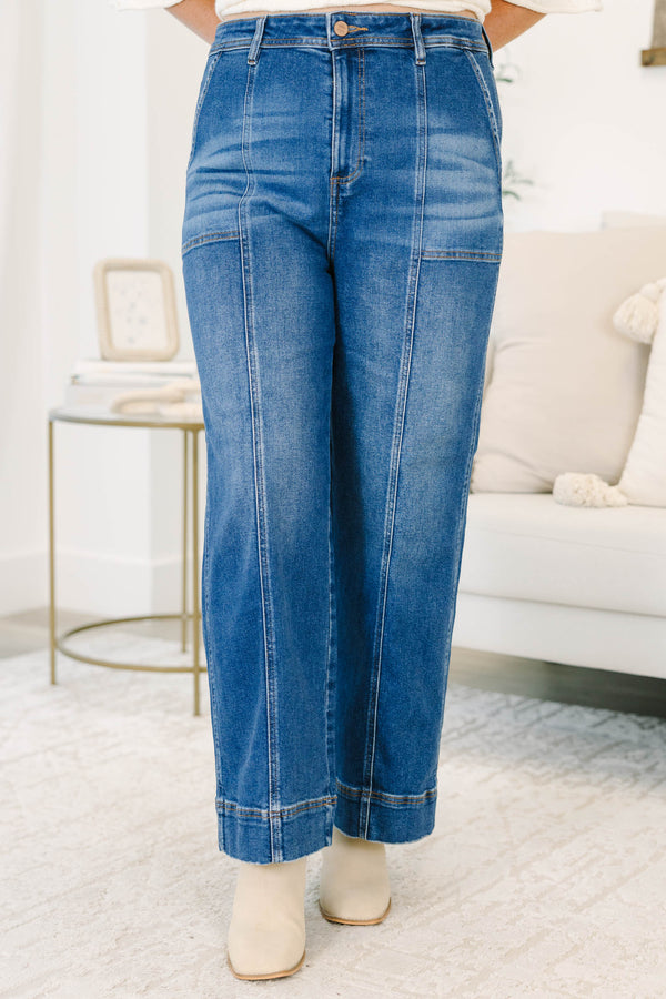 Plus Size dark wash wide leg jeans with front seam detailing and a high-waisted fit.