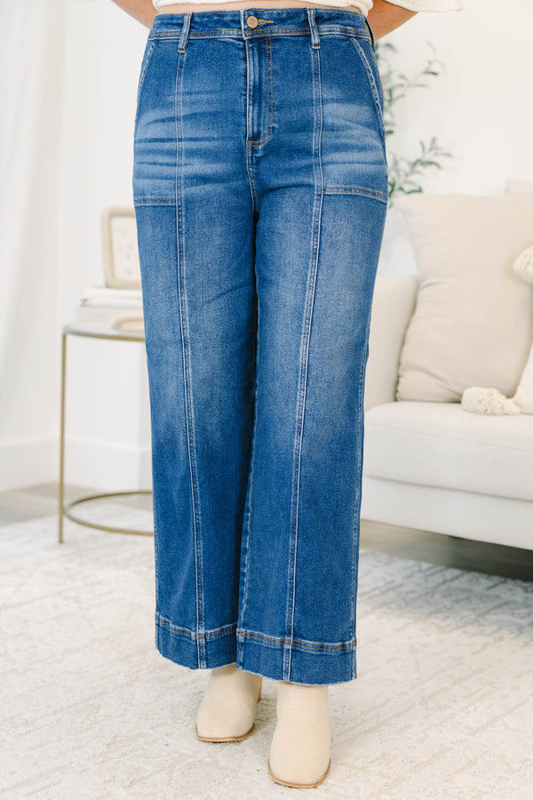Plus Size dark wash wide leg jeans with front seam detailing and a high-waisted fit.