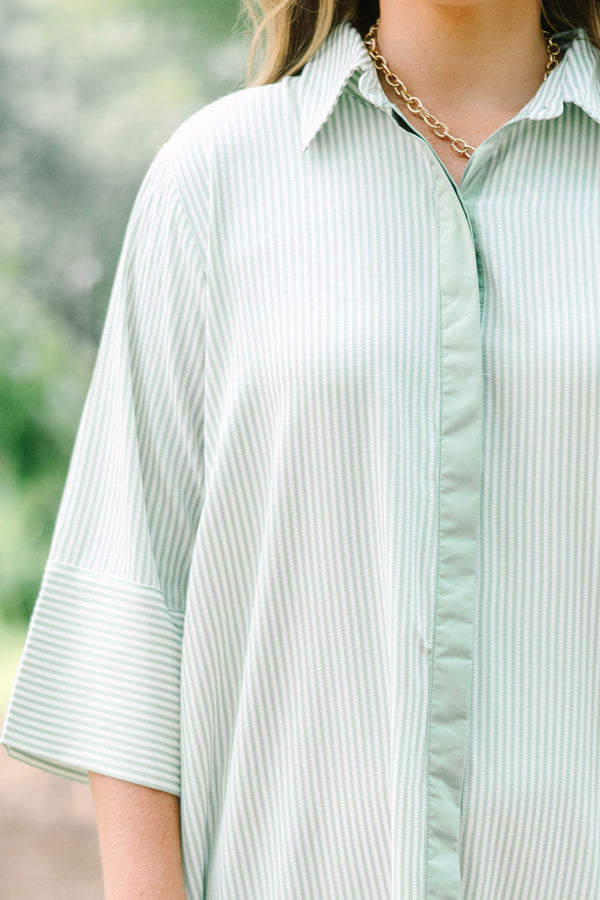 Plus Size green and white striped maxi shirt dress with quarter sleeves and front button closure.