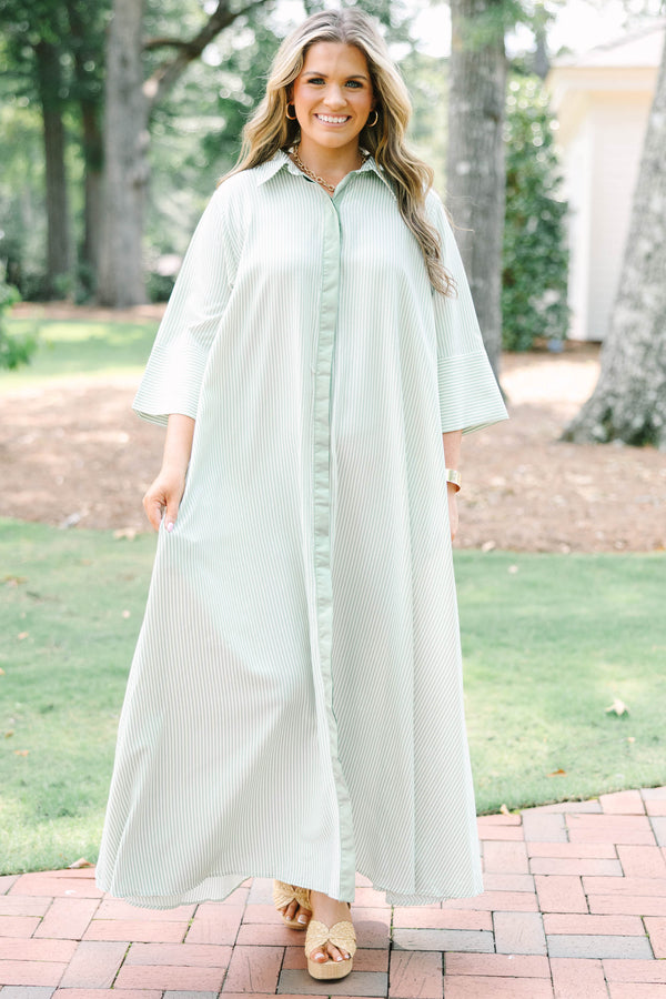 Plus Size green and white striped maxi shirt dress with quarter sleeves and front button closure.