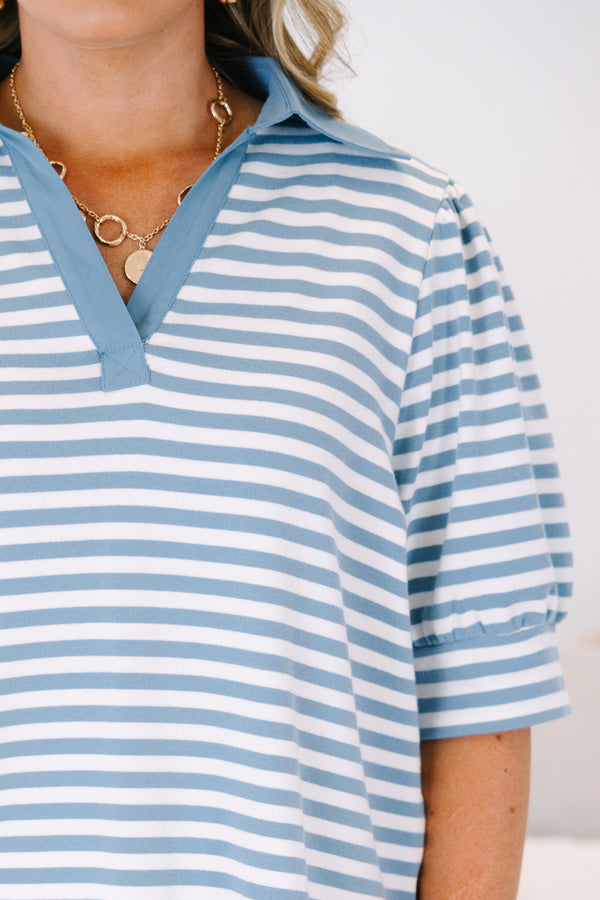Plus Size blue and white horizontal striped top with a v-neckline and puff sleeves.
