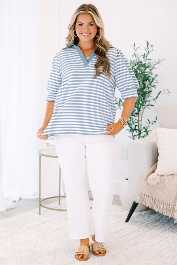 Plus Size blue and white horizontal striped top with a v-neckline and puff sleeves.