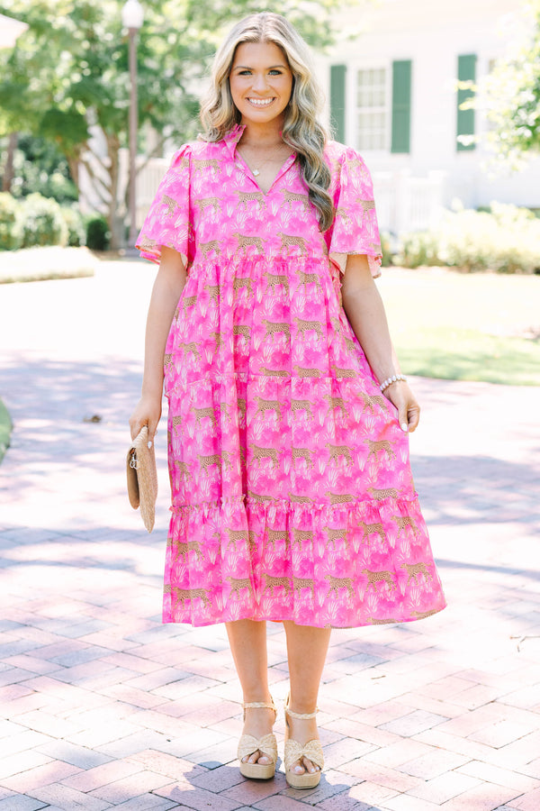 Plus Size fuchsia tiered midi dress with a leopard and palm print, v-neckline, and flutter sleeves.