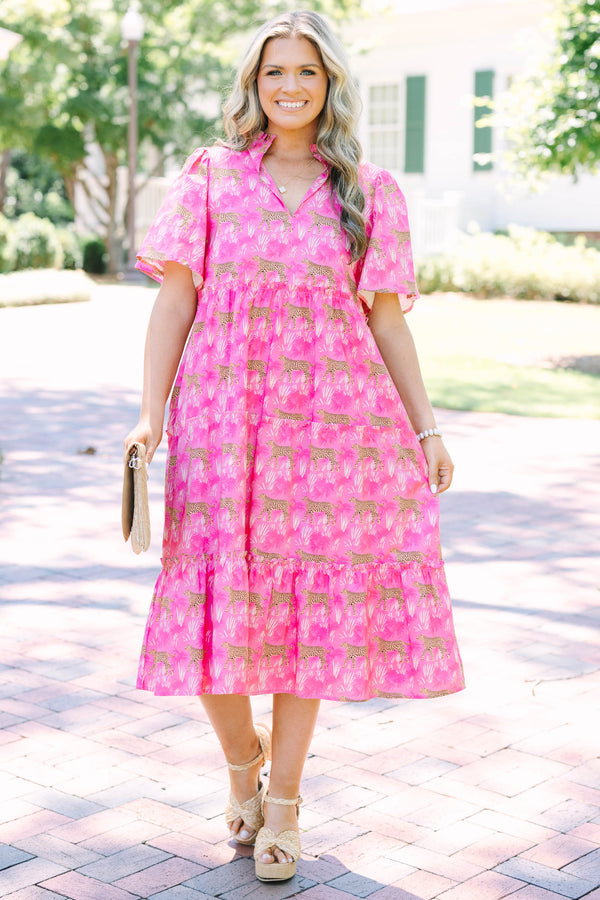 Plus Size fuchsia tiered midi dress with a leopard and palm print, v-neckline, and flutter sleeves.