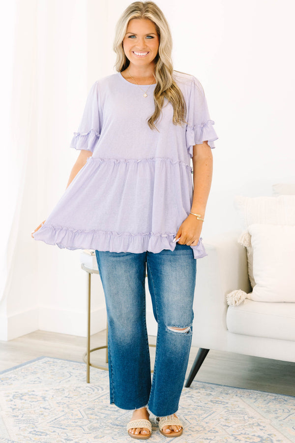 Plus Size purple babydoll top with ruffle trim on the short sleeves, waistline, and hem.