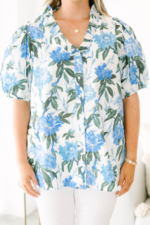 Plus Size ivory button-up top with blue floral print, ruffled collar, and puff sleeves.