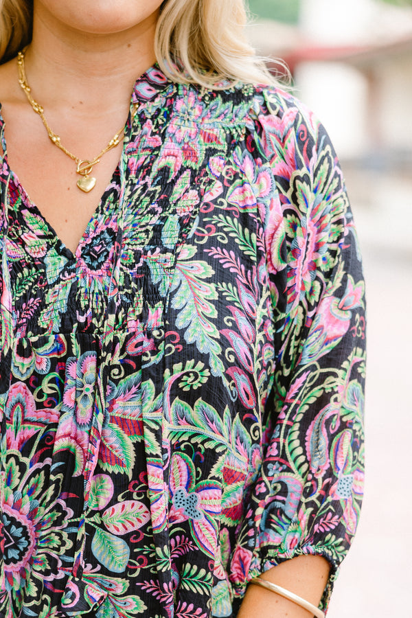 Chic Soul plus size clothing, Black top with half sleeves and a multi-color floral pattern throughout 