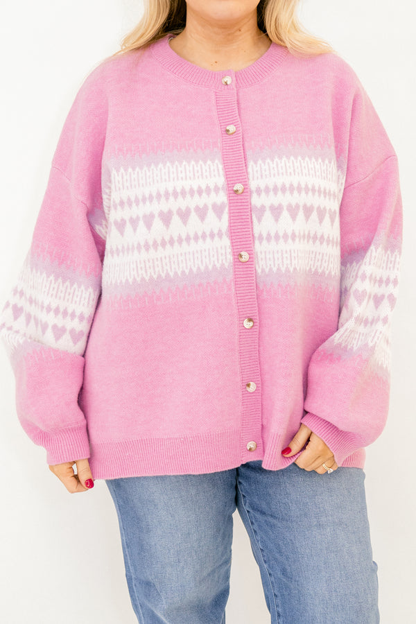 Chic Soul plus size clothing, light pink slouchy long sleeve cardigan with white and purple heart pattern across the middle and wooden button along the front