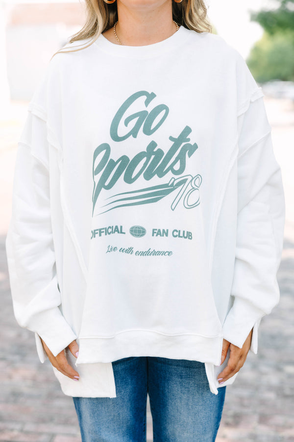 Plus Size ivory crew neck sweatshirt with a green Go Sports graphic and relaxed, oversized fit.