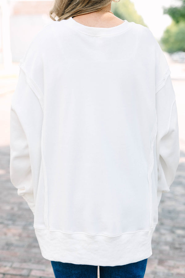 Plus Size ivory crew neck sweatshirt with a green Go Sports graphic and relaxed, oversized fit.