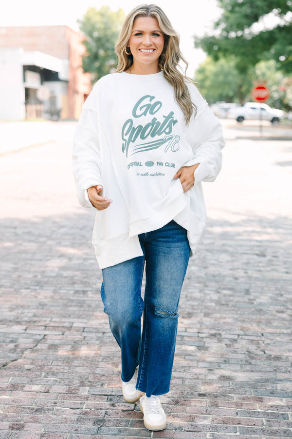 Plus Size ivory crew neck sweatshirt with a green Go Sports graphic and relaxed, oversized fit.