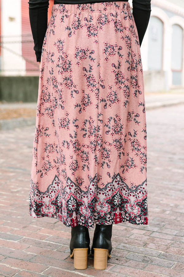 Plus Size pink floral maxi skirt with a bold border print hem and relaxed silhouette.